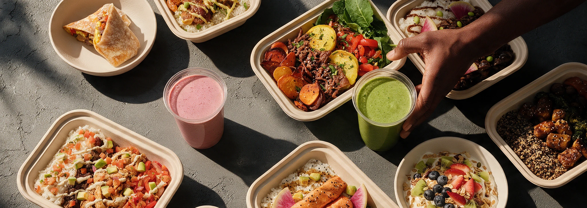 A table filled with fresh meals for a team